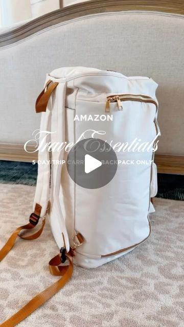 a white bag sitting on top of a carpeted floor