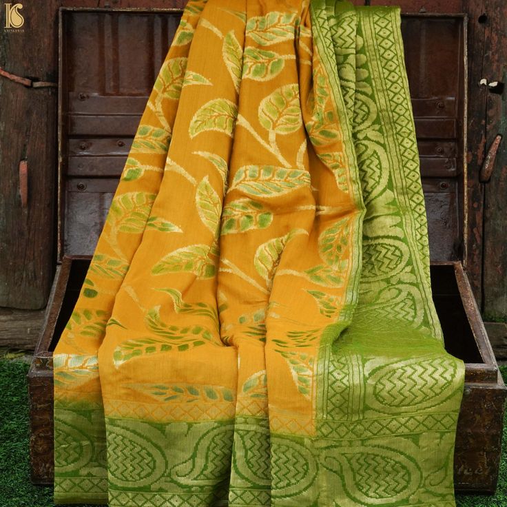 Category: Moonga Silk Saree Get ready to wear this stunning Banarasi silk saree. Woven with passion and excellence, this Handloom Banarasi silk saree won't fail to catch attention. Moonga silk sarees are known for its longevity and resilience, they make you fall in love with them. Fabric - Pure Moonga Silk - It is known for its resilience. It can be given a fine texture by dry ironing it in a damp state or it can attain a crushed look by not getting ironed. This is one unique fabric where the go Moonga Silk Sarees, Mustard Green, Mustard Greens, Plain Blouse, Banarasi Silk Saree, Unique Fabric, Banarasi Saree, Banarasi Sarees, Cut Work