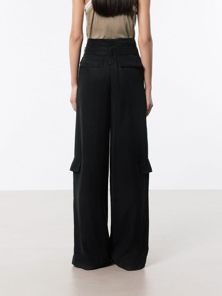 MO&Co. Women's Wide Leg Cargo Pants These pants are made from sustainable and eco-friendly materials, featuring a wide-leg and cargo style making them a fashionable and practical choice for a casual or streetwear look. The wide pocket design adds functionality and versatility, perfect for carrying essentials while on the go, and the belt ensures a secure fit and adds an extra touch of style. The brown pants may appear olive or khaki under different lighting. Features : - Wide leg in cargo style, Wide Leg Cargo Pants, Cargo Style, Brown Pants, Pocket Design, Cargo Pants, Carry On, Wide Leg, Eco Friendly, Street Wear