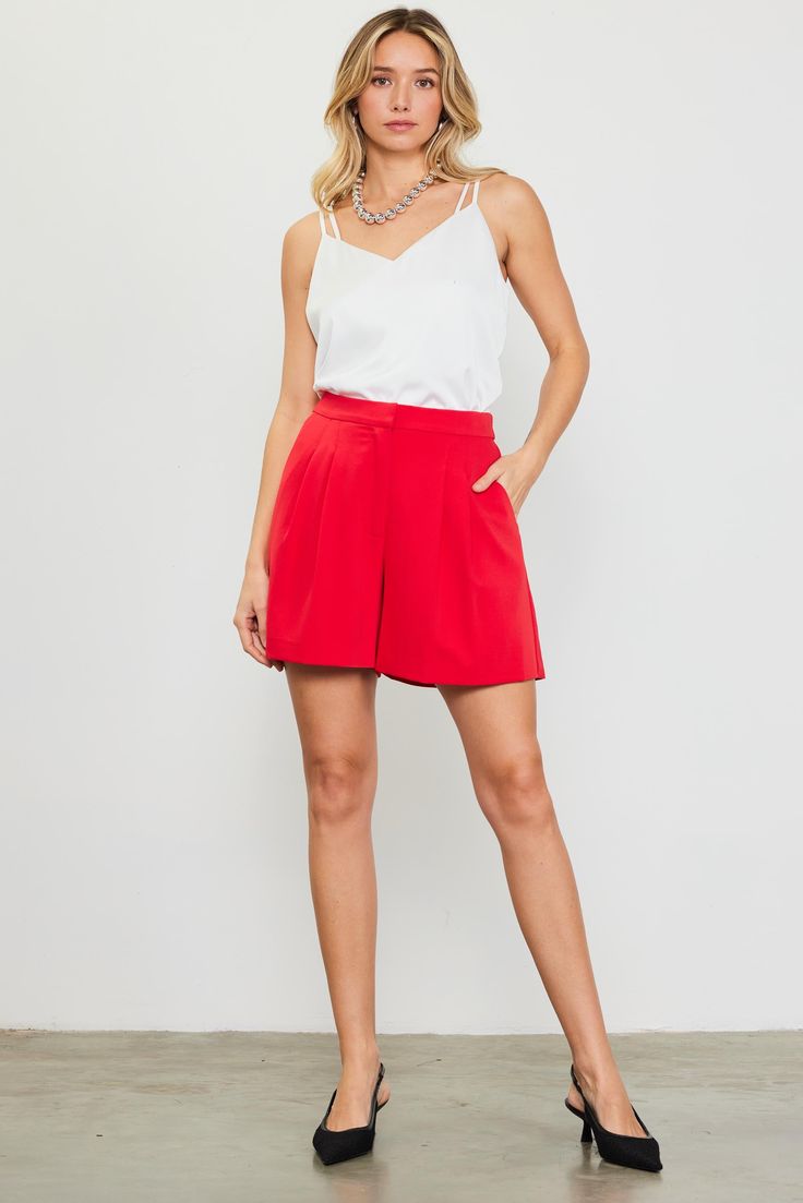 Simple and classic, these high-rise shorts have a clean front waistband and pleat detailing. They're elasticized at the back waist, so you can move through the day in comfort. A natural companion piece to our sleeveless tailored blazer. •High waist •Pleated front •Zip fly •Elasticized back waistband •Side Slant Pockets Item Number: 74606 100% POLYESTER Vacation Dresses Casual, Wedding Guest Dress Trends, Casual Wedding Dress, Tailored Blazer, Pleated Shorts, Sweater Sale, Trending Dresses, Skirts For Sale, Shorts With Pockets