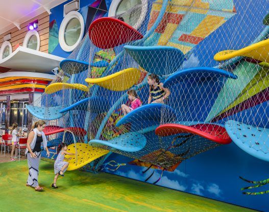 children are playing in the indoor play area on board cruise ship, carnival city photo by person