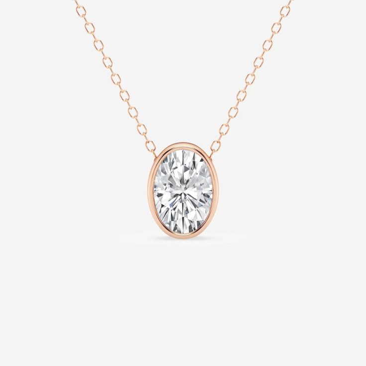 This pendant is sure to get you your fair share of compliments!  This gorgeous bezel set pendant features an oval cut lab grown diamond, one of our most popular shapes. Wear this for any occasion, from the beach to the boardroom! Solitaire Setting, Solitaire Pendant, Oval Pendant, Bezel Diamond, East West, Lab Created Diamonds, Bezel Setting, Oval Cut, Lab Grown