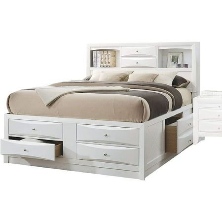 a white bed with drawers underneath it