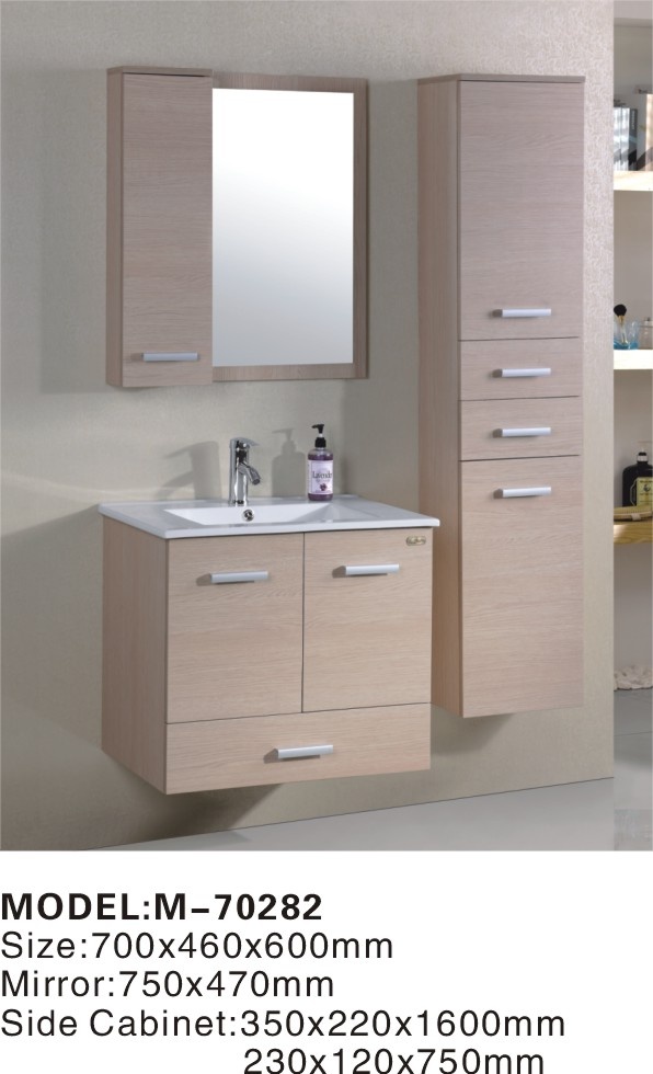 a bathroom vanity with two drawers and a mirror on the wall next to it is shown