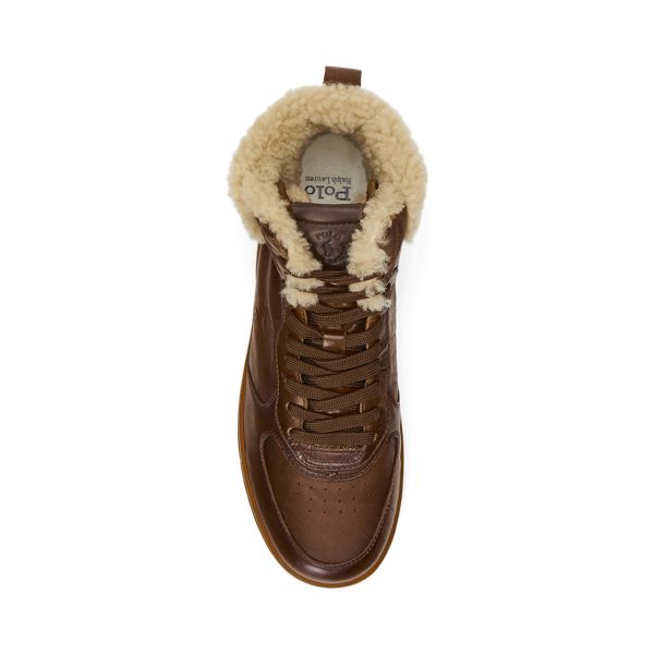 The Masters Mid updates Polo’s classic Court sneaker adding a leather heel clip an EVA midsole and a substantial sole. Crafted with tumbled leather and genuine shearling this high-top style combines streetwear design elements like a perforated vamp with subtle logo accents. The Masters, Leather Heels, High Top, Design Elements, High Tops, Top Styles, Shoes Mens, Ralph Lauren, Street Wear