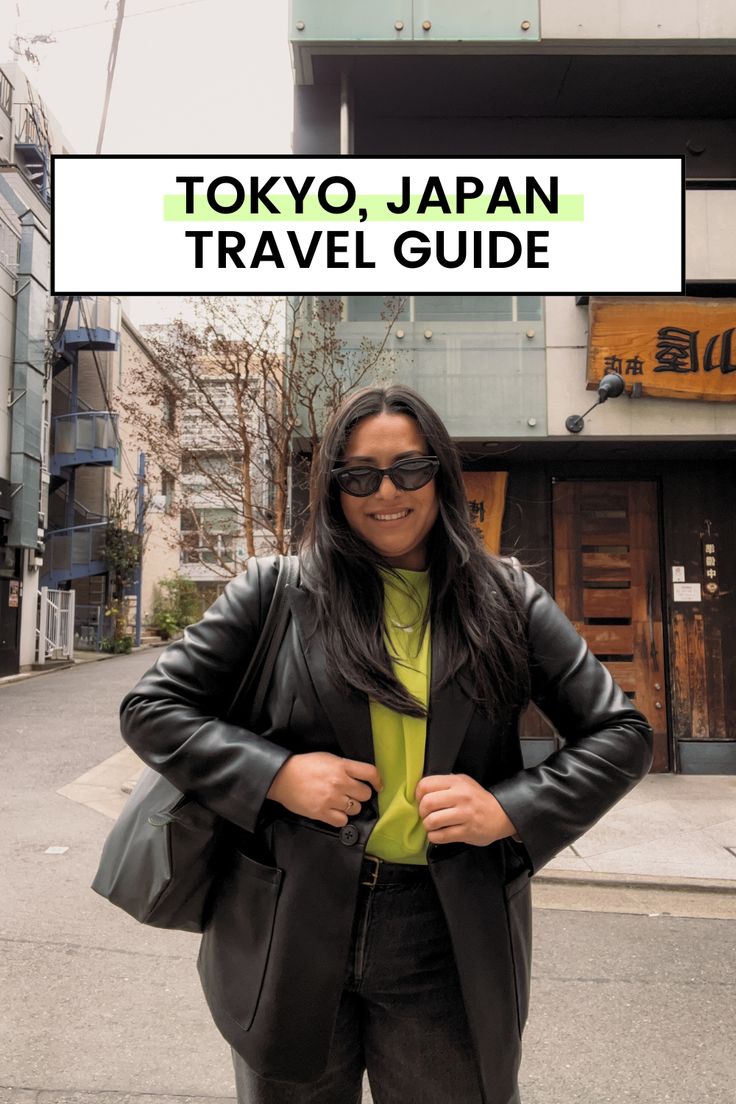 a woman standing in front of a building with the words tokyo japan travel guide above her