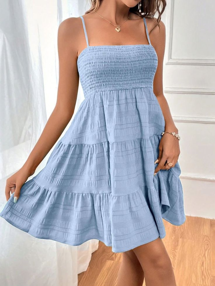 Embrace a touch of elegance with our Tiered Smocked Square Neck Cami Dress. Crafted from premium fabric, this dress features a charming tiered design and a flattering smocked bodice, perfect for any casual or semi-formal occasion. The square neckline and cami straps add a delicate touch, while the comfortable fit ensures all-day wear. This product typically ships in 5-10 days. Features: Basic style Sheer: Opaque Stretch: Slightly stretchy Body: Not lined Material composition: 95% polyester, 5% s Graduation Dresses, Mini Cami Dress, Quick Outfits, Textured Dress, Costume Intero, Fairy Dress, Sleeveless Mini Dress, Outfit Casual, Cami Dress