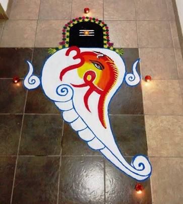 a decorated floor with lights on it and a sign that says lord ganesha