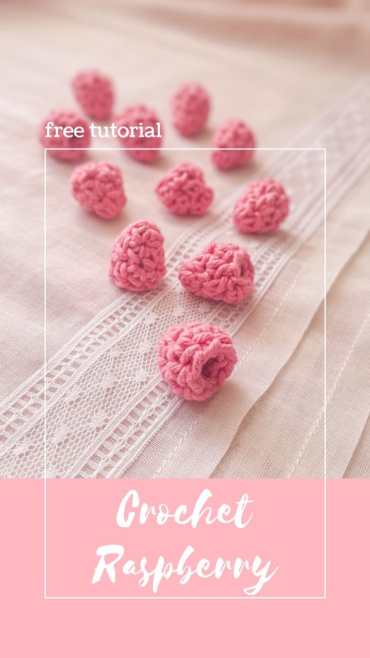 pink crocheted hearts sitting on top of a white table cloth with text overlay