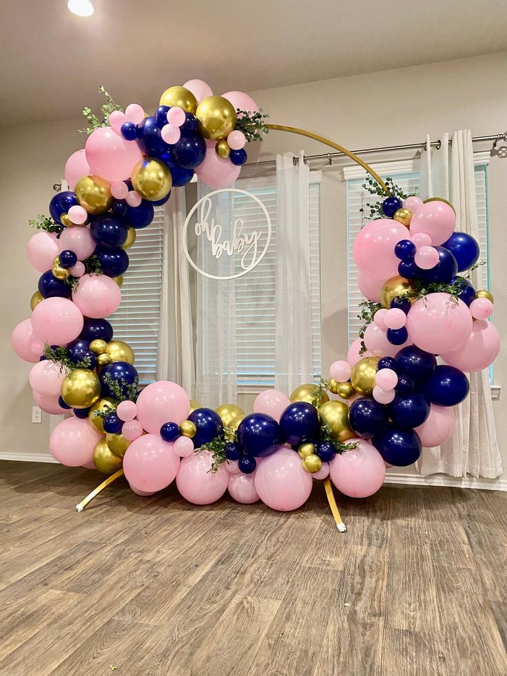 Let's build your very own balloon garland with our signature WOW Party Art Kit! Created and designed by PROFESSIONAL BALLOON ARTISTS, our WOW DIY Balloon Garland kits include everything that our own decorators use!  Leave glue dots, fishing line and curling ribbon to amateurs - we do things the professional way!  INSIDE EVERY KIT:  ✔ All the high-quality professional balloons you will need  ✔ 260Q balloons to make tying and hanging your garland easy  ✔ Adhesive wall hooks  ✔ Instructions and tut Navy Blue And Pink Gender Reveal, Gender Reveal Backdrop Ideas, Neutral Gender Reveal, Ring Balloon, Gender Reveal Backdrop, Diy Balloon Arch, 60 Balloons, Your Highness, Bead Bra