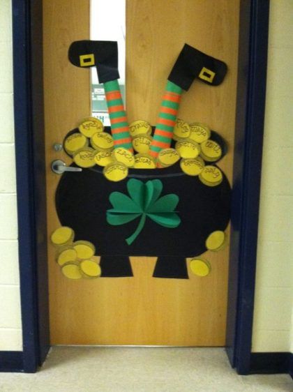 a door decorated to look like a pot full of gold coins and wearing green striped socks