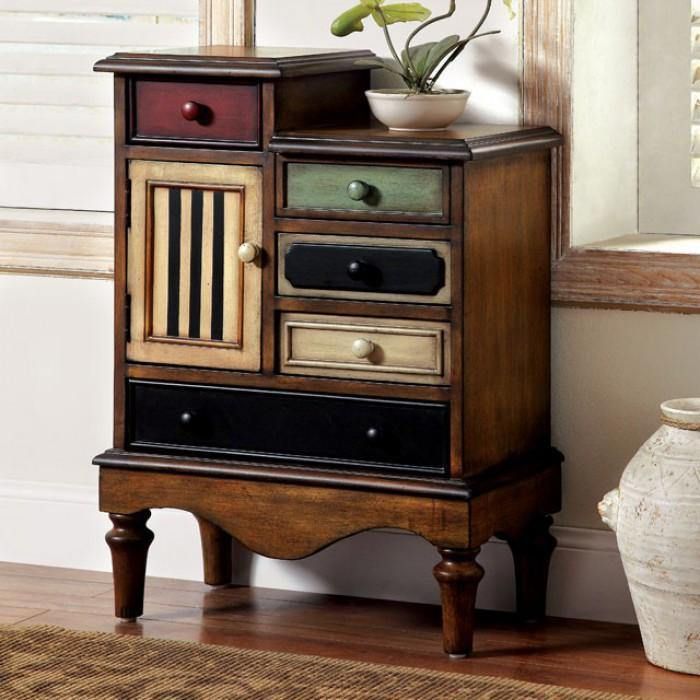 a wooden cabinet with several drawers in front of a window and a vase next to it