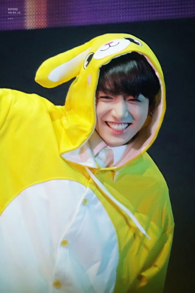 a person in a yellow bunny costume