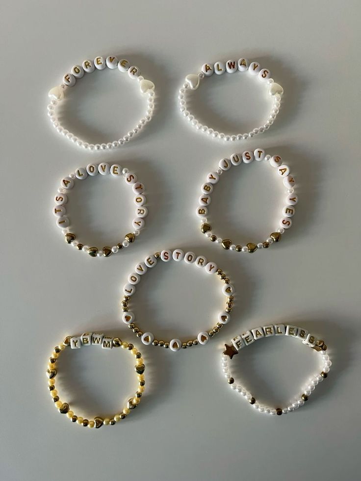 six bracelets with pearls and gold beads