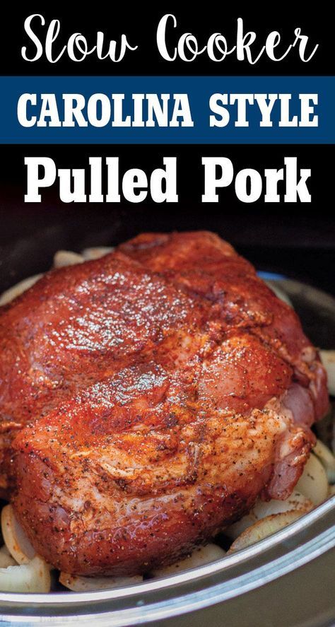 slow cooker carolina style pulled pork in the crock pot with text that reads slow cooker carolina style pulled pork