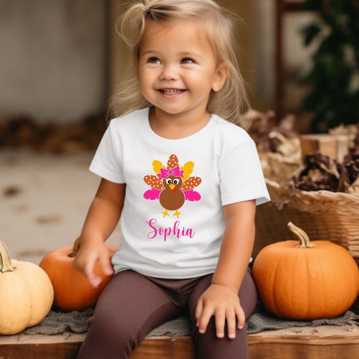 Once you make a purchase, the seller will contact you via email to discuss personalization. Please check email within 24 hours of purchase. Personalized Fall Turkey White Thanksgiving Shirt Celebrate Thanksgiving with a unique touch using our Personalized Fall Turkey White Thanksgiving Shirt. This custom shirt is perfect for showcasing your festive spirit and adding a personal flair to your holiday celebrations. Key Features: Customizable Design: Features a delightful turkey graphic with customi Shirts To Make, Newborn Black Babies, Spring Cups, Christmas Wine Glasses, Christmas Baby Announcement, Bridal Shirts, Handmade Beanies, Valentines Day Baby, Turkey Shirts