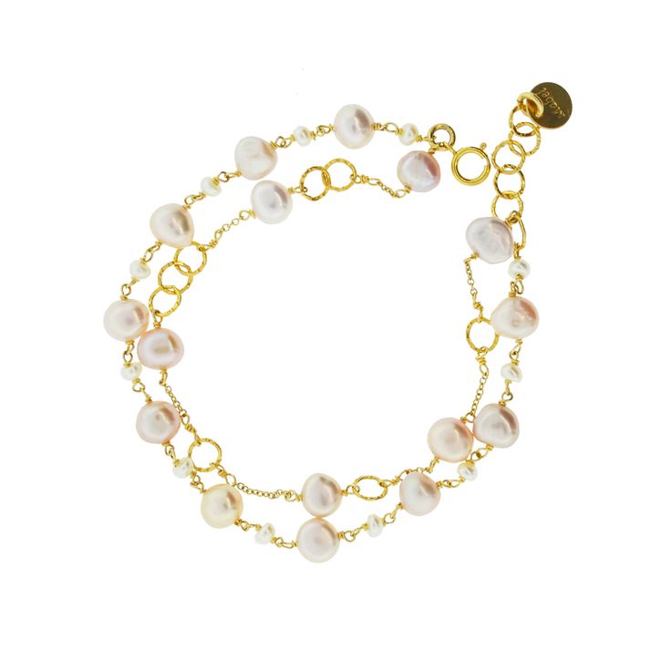 A delicate and feminine bracelet in a classic combination of gold and pearls. Flat ligt pink fresh water pearl with gold filled chain and findings. Length: 6.5-8 adjustable Pearl measures 5-6mm Fresh Water Pearl Bracelet, Feminine Bracelet, Gold And Pearls, Bracelets Diamond, Moss Aquamarine, Double Heart Necklace, Triangle Necklace, Daily Jewelry, Freshwater Pearl Bracelet