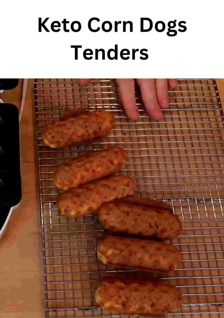 some sausages are on a cooling rack and someone is cooking them