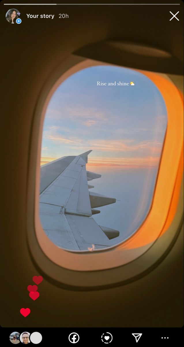 an airplane window looking out at the sky