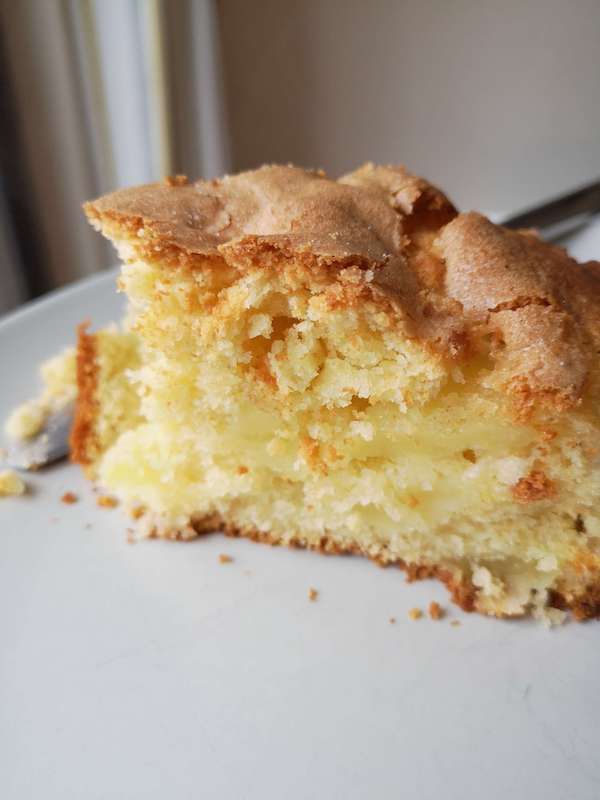 a piece of cake sitting on top of a white plate