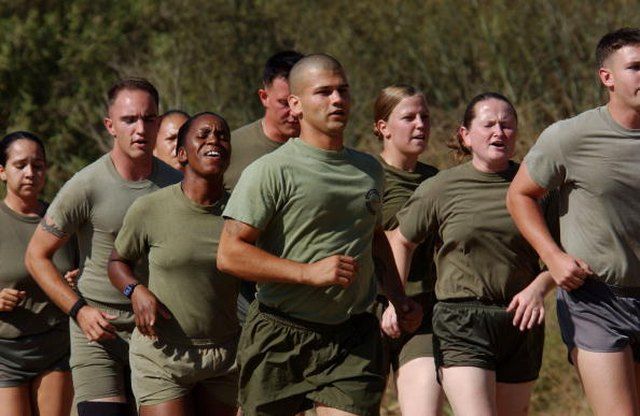 a group of men and women running together