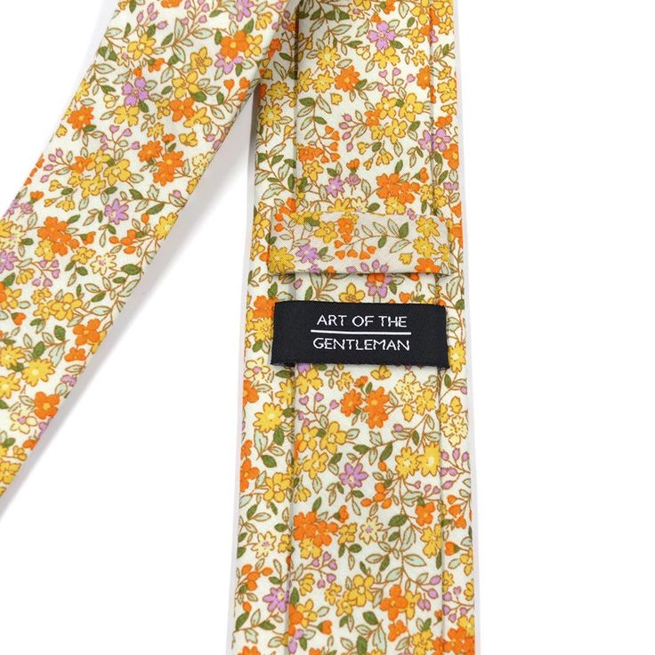 Handmade with 100% imported cotton fabric. Perfect for work, weddings or a night out on the town. This Floral Yellow Field Blossoms Tie will make you feel like the gentleman you aspire to be or accentuate the gentleman you already are. You’ll look good, feel good and do good things in this tie. Makes the perfect gift for a fellow gentleman or for that man in your life by making them look good and feel good. We guarantee your satisfaction with our free refund policy.* Goes Good With: Grey, Navy, Orange Pocket Square, Yellow Field, Yellow Fields, Gold Deer, Flower Tie, Dapper Day, The Gentleman, How To Start Conversations, Look Good Feel Good