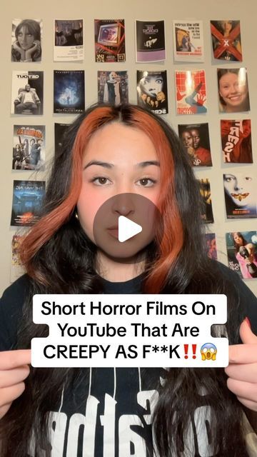 a woman with long hair holding up a sign that says short horror films on youtubeble that are creepy as f k