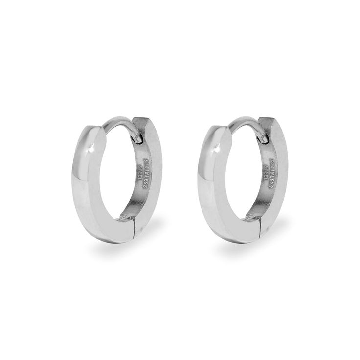 Make a simple statement with this stainless steel huggie earrings. The 1/2 inch flat  chunky hoops style closes securely with a notched post and give the look of a 1/8 inch wide continuous hoop with a soft rounded edge. The durable stainless steel features a high polish finish making it a classic style perfect for both day and evening looks.        Details: • 1/2 Inch Flat Earring Huggies • Soft Rounded Edges • Durable Stainless Steel Hypoallergenic Metal Huggie Earrings, Nickel-free Huggie Hoop Earrings In Stainless Steel, Nickel Free Huggie Hoop Earrings In Stainless Steel, Minimalist Stainless Steel Tarnish Resistant Huggie Earrings, Silver Stainless Steel Hoop Huggie Earrings, Silver Stainless Steel Tarnish Resistant Huggie Earrings, Silver Tarnish Resistant Stainless Steel Huggie Earrings, Silver Stainless Steel Tarnish-resistant Huggie Earrings, Nickel-free Stainless Steel Huggie Earrings