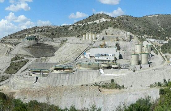 an industrial area in the middle of a mountain