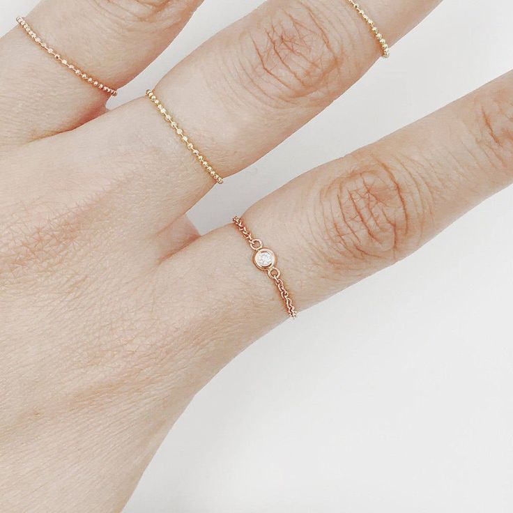 JSVConcepts Fine Jewelry Dainty Diamond Chain Ring, Natural Diamond Set Bezel Chain Ring, Brilliant Cut Diamond Ring, 14K Solid Gold Minimalist Ring, Christmas Gift ≫ Product Details ◈ Handmade / Handcrafted Fine Jewelry ◈ Diamond: 100% Natural Diamond ◈ Carat Weight: 0.03 Ct. ◈ Color: F-G ◈ Clarity: VS2-SI1 ◈ Cut: Brilliant Cut ◈ Metal: 14K Solid Gold (18K also available - Additional fees may apply) ◈ Gold Color: White gold, Rose gold, Yellow gold ≫ Please read our FAQ below for more detail. Minimalist Round Midi Rings With Bezel Setting, Gold Minimalist Ring, Brilliant Cut Diamond Ring, Chain Diamond, Solid Gold Chains, Jewelry Dainty, Diamond Chain, Minimalist Ring, Gift Product