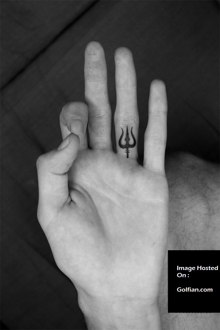 a person holding their hand up with two fingers in the shape of an x and y