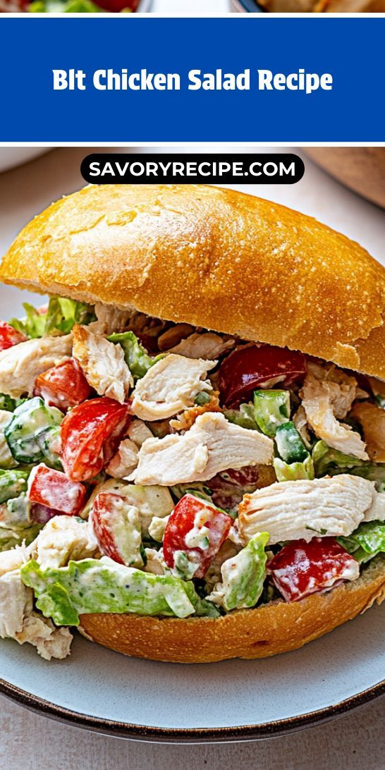 a chicken salad sandwich with lettuce and tomatoes