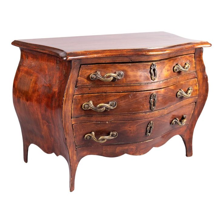 an antique chest of drawers with brass handles and knobs on the front, against a white background