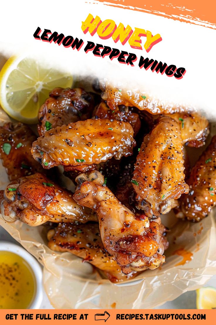 honey lemon pepper wings on a plate with dipping sauce