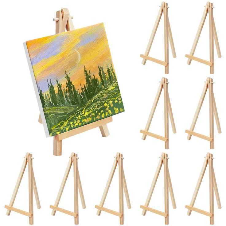 a set of six easels with paintings on them