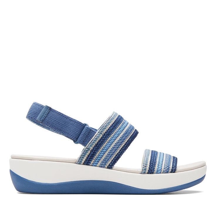 PRICES MAY VARY. A new addition to our ever-popular Cloudsteppers collection, our sporty chic sandal Arla Stroll is all about lightness and feeling free – just what summer calls for Soft blue textile upper Adjustable closure offers a secure, custom fit Machine-washable for easy warm-weather care Cushion Soft foam footbed offers lasting comfort Blue Combination, Shoe Care Kit, Chic Sandals, Hiking Sandals, Clarks Women's, Womens Clarks, Blue Sandals, Sporty Chic, Shoe Care