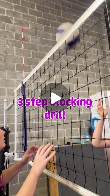 two girls are playing volleyball in front of a brick wall with the words 3 step blocking drill