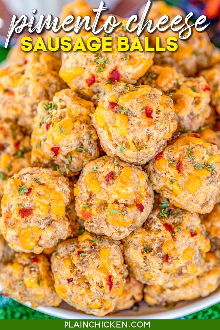 a white plate filled with cheesy biscuits on top of a green table cloth