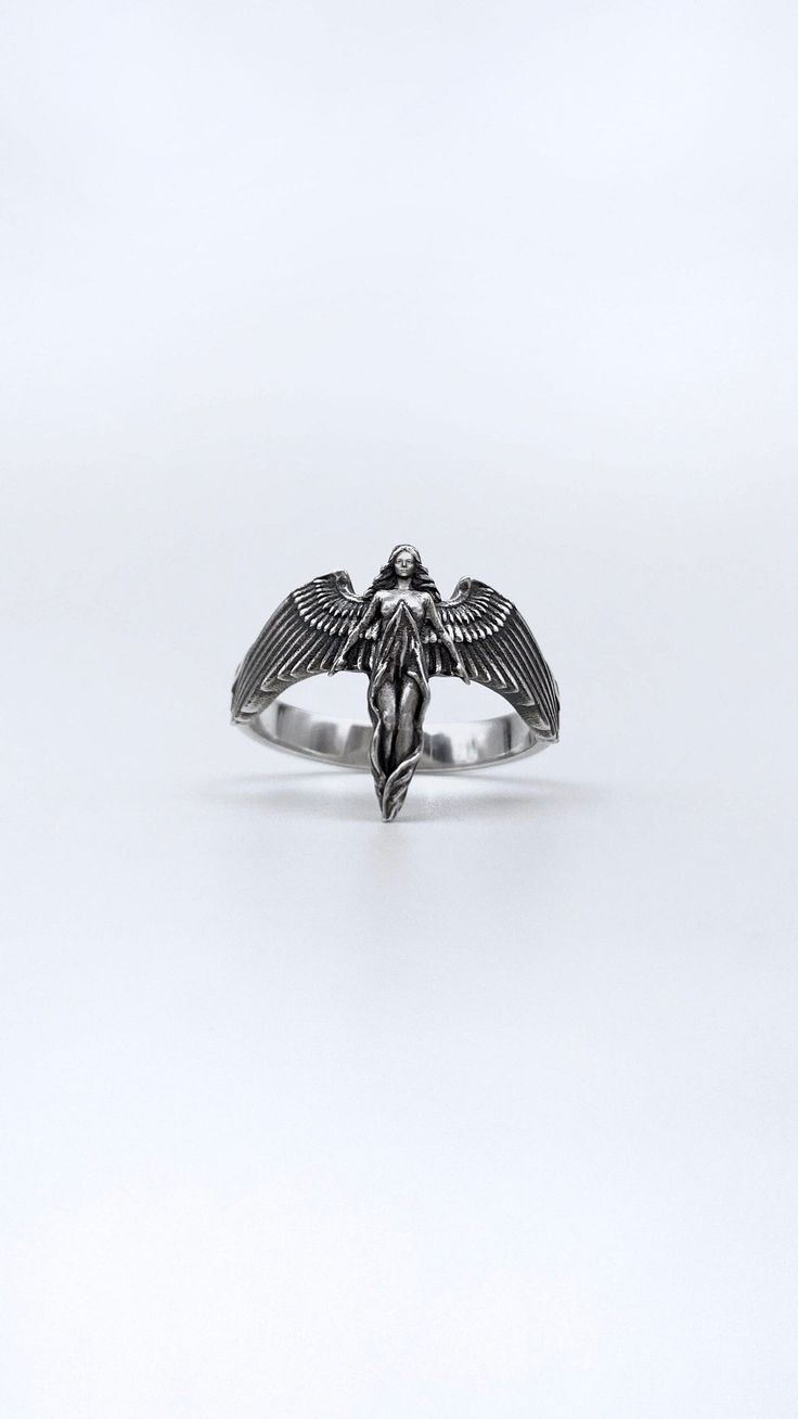 Sterling Silver Angel Ring, Religious Ring, Christian Culture Jewelry, Mythology Lovers Gift, Handmade Antique Jewelry, Christian Ring Elevate your style with our Silver Angel Ring, a timeless piece that embodies the serenity and grace of celestial beings. This ethereal ring features an intricately designed angel, creating a symbol of divine elegance that resonates with the spirit of hope and protection. The ring showcases a beautifully detailed angel, capturing the essence of celestial grace an Symbolic Metal Promise Ring, Gothic Stainless Steel Ring As A Gift, Gothic Rings With Oxidized Finish For Gift, Gothic Oxidized Rings For Gift, Gothic Oxidized Finish Rings As Gift, Gothic Oxidized Finish Rings For Gift, Gothic Stainless Steel Promise Ring, Symbolic Handmade Stainless Steel Rings, Handmade Symbolic Stainless Steel Rings