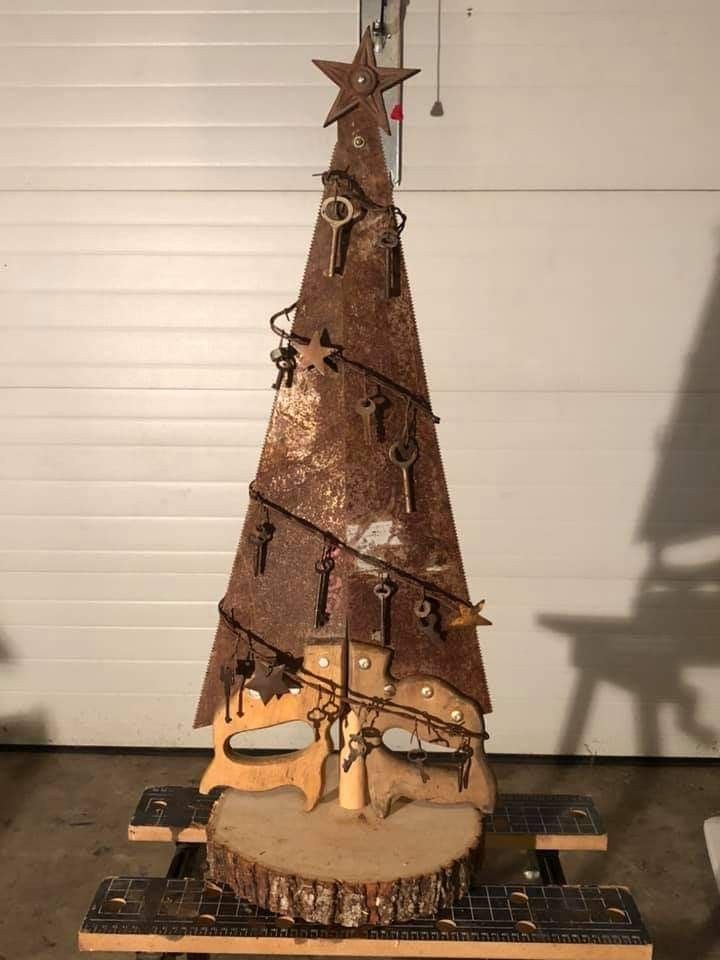 a christmas tree made out of wood and metal