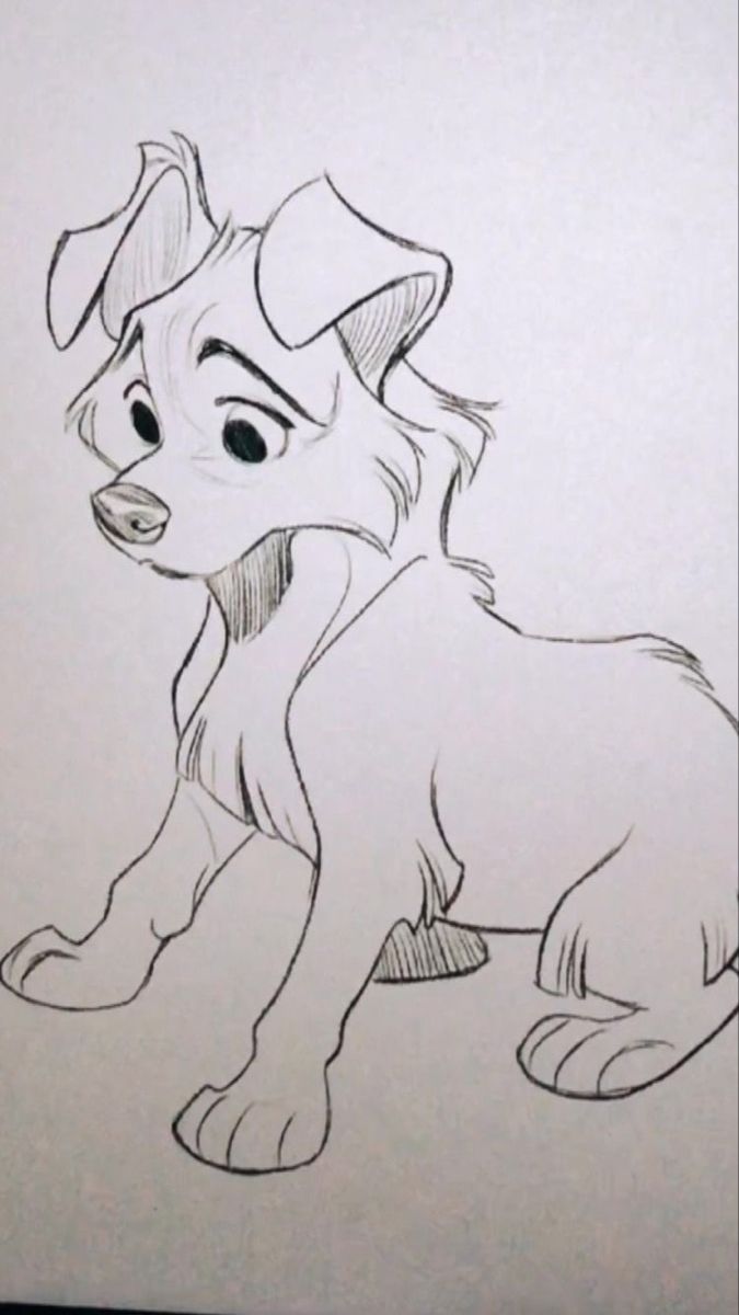 a drawing of a dog sitting on top of a sheet of paper with the word disney written