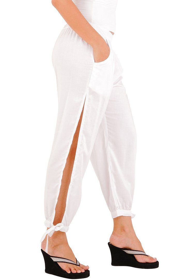 Shu-Shi women's summer harem pants feature a comfortable, lightweight style, that is both classy, yet sexy. The pants can be used as bikini cover-ups and can easily transition from daytime to nighttime by adding heels. Sexy side slits Side pockets 100% Rayon Machine wash cold water Summer Vacation Harem Pants Ankle-length, Summer Harem Pants With Pockets, Summer Beach Harem Pants With Pockets, Summer Ankle-length Harem Pants With Elastic Waistband, Summer Harem Pants With Pockets For Vacation, Summer Vacation Harem Pants With Pockets, Casual Harem Bottoms For Beach, Casual Ankle-length Harem Pants For Beach, Summer Vacation Harem Pants With Elastic Waistband