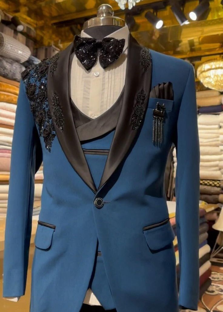 a blue tuxedo jacket with black trimmings