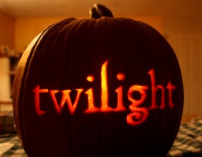 a pumpkin with the word twilight carved into it