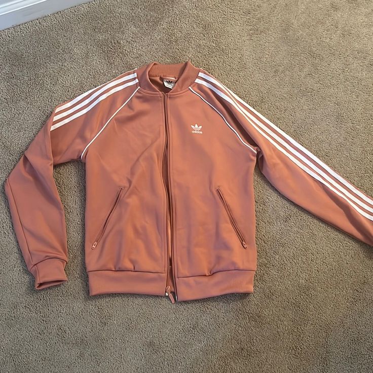 Adidas Zip Up, Pink Color, Never Worn Adidas Long Sleeve Track Jacket For Spring, Adidas Long Sleeve Spring Track Jacket, Adidas Casual Track Jacket For Spring, Sporty Brown Spring Outerwear, Sporty Brown Outerwear For Spring, Adidas Pink Track Jacket For Spring, Pink Adidas Track Jacket For Spring, Spring Adidas Fitted Track Jacket, Adidas Fitted Track Jacket For Spring