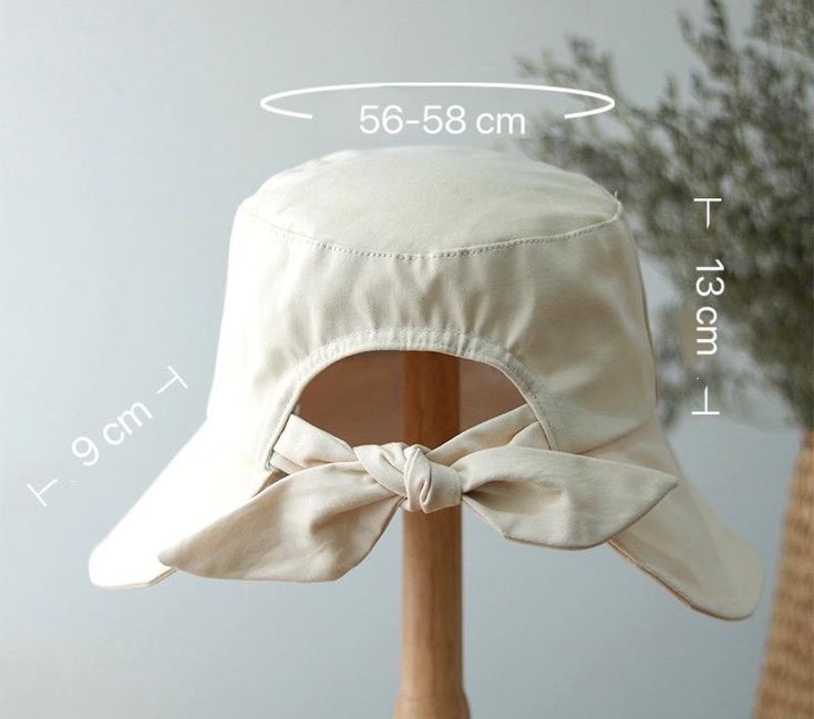 Beige Cotton Bucket Hat For Everyday Wear, Everyday Cream Cotton Sun Hat, Adjustable Cotton Bucket Hat With Curved Brim, Beige Cotton Bucket Hat With Short Brim, Adjustable White Cotton Bucket Hat, White Cotton Bucket Hat One Size, Adjustable Fit Cotton Brimmed Bucket Hat, Adjustable Cotton Bucket Hat With Wide Brim, Adjustable Cotton Sun Hat