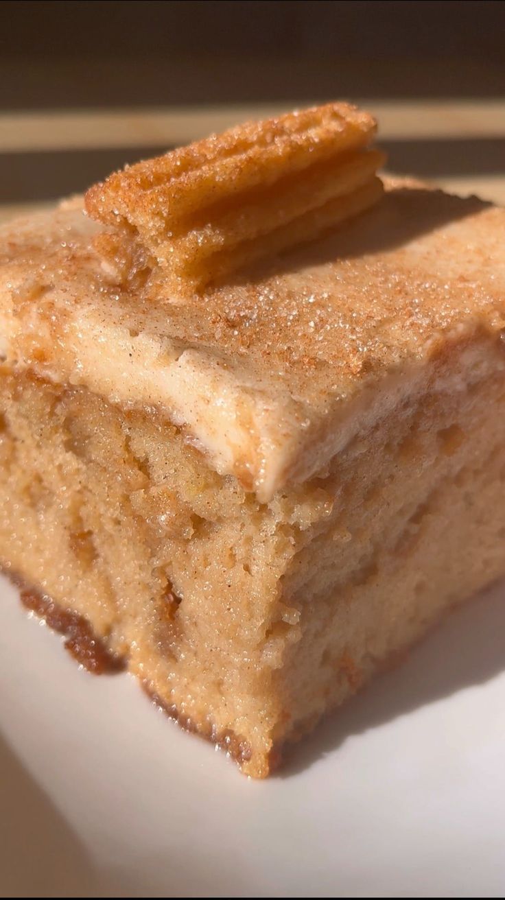 a piece of cake sitting on top of a white plate