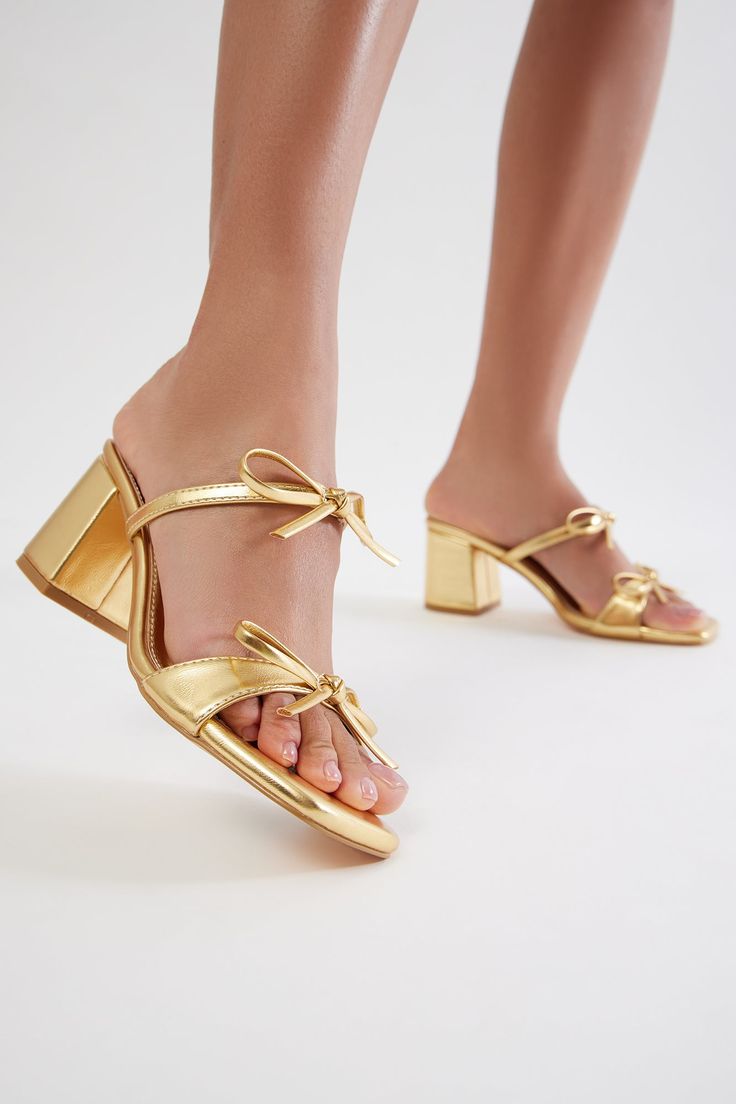 Available In Black And Gold. Heeled Mules Square Toe Bow Detail Block Heel Imported | Maribelle Bow Heeled Mules Heel Shoes in Gold size 7 by Fashion Nova Gold Wedding Shoes Low Heel, Gold Kitten Heels, Gold Shoe, Gold Wedding Shoes, Golden Birthday, Bow Heels, Gold Shoes, Gold Fashion, Heel Shoes