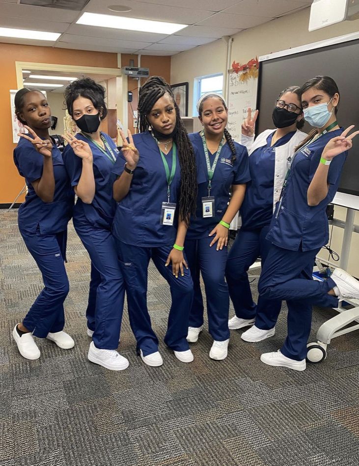 the nurses are all wearing masks to protect them from the corona pandemic disease