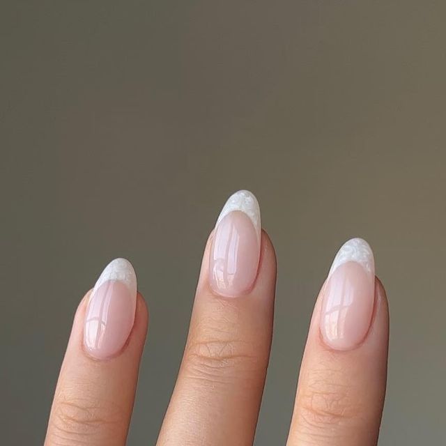 Alison • nailsbyalsn on Instagram: "stills of these pearly french tips i did not too long ago 🦪✨☁️   swipe to see some close ups 🦋  Using @gelcare.official  Freshwater Pearl Nude Bb Creme *discount code: NAILSBYALSN to save (aff)  Ring from @treasurebox.jewelry   —————- #nudenails #bridalnails #pearlnails #bridal #gelnails #nailinspo #frenchtips #cutenails" French Tip And Pearls, French Tip With Pearl Top Coat, Pear French Tip Nails, Pearl Tipped Nails, Pearlescent French Tips, Pearl French Tips Nails, Pearl Nail French Tip, Pearly French Nails, Oyster French Tip Nails